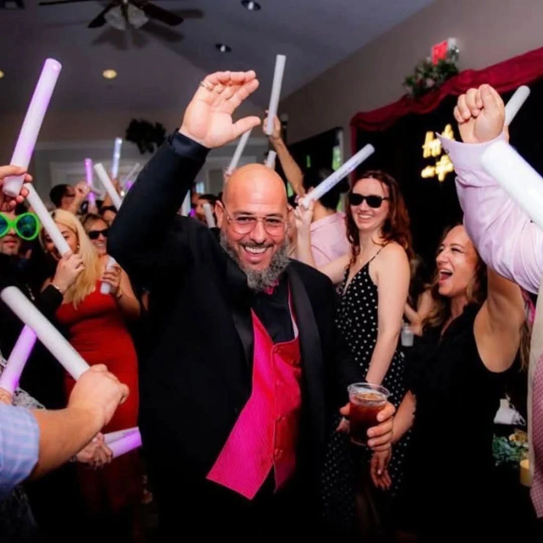 High-energy Sweet 16 dance floor with colorful lighting